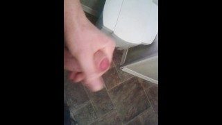 using my phone as i cum on the floor in public bathroom